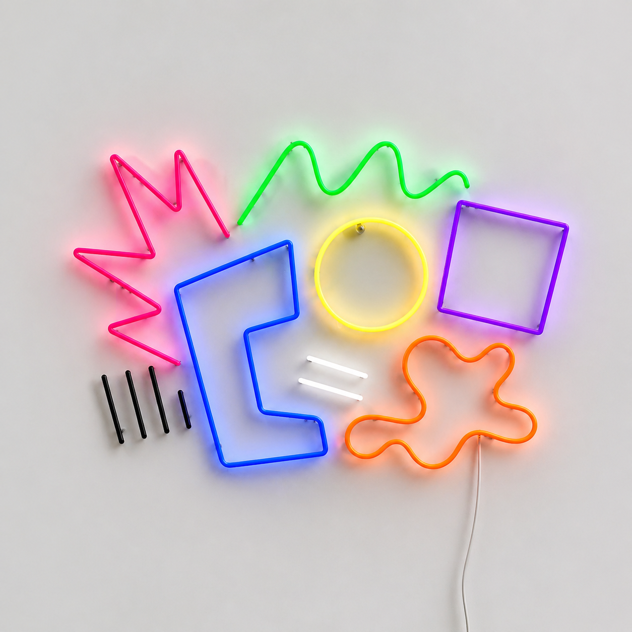 Néon LED Memphis composition de formes géométriques multicolores style design 80s sur mur blanc